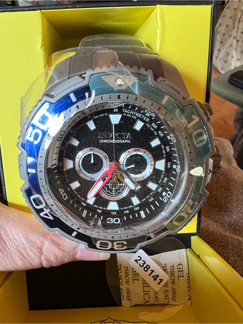 Invicta Men’s Black Dial Silver Case Chronograph Watch with Blue Accent